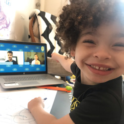 Child smiling while having virtual experience